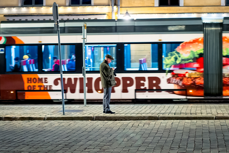 Commercial storefront framing daily life by Jukka Heinovirta